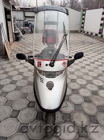 Продам скутер Хонда Лид кабина объемом 90 куб Алматы - photo 1