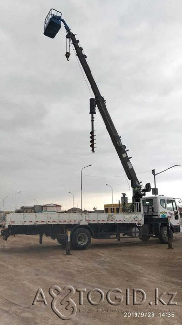 Атырау қ. электр желісі бағаналарын, қоршау тіректерін монтаждау (монтаждау және демонтаждау). Атырау - 1 сурет