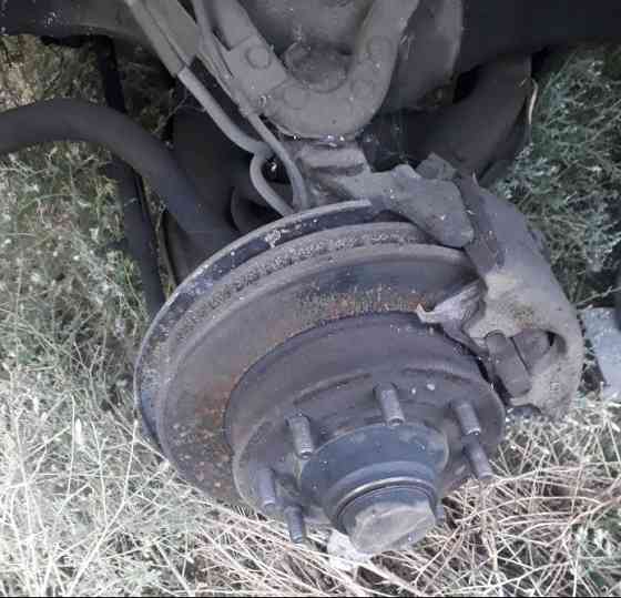 На Шевролет Субурбан Тахо Бампер пружины суппорт крыло дверь стекло капот панель фендера мост рама Алматы