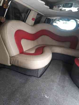 Салон лимузина Линкольн Навигатор и Шевролет Субурбан сиденья диван сидушки электро перегородка Алматы