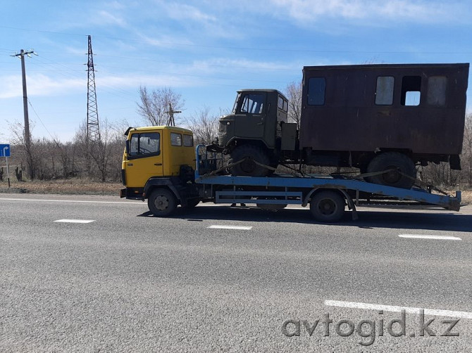 Эвакуатор Актобе перевозка грузов и спецтехники Актобе - photo 1
