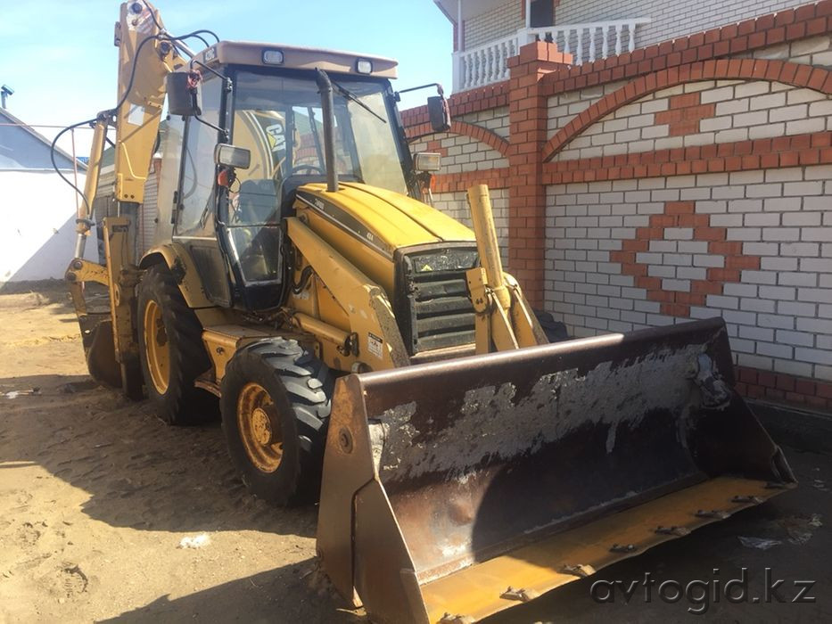 Экскаватор тиегіш Cat Актобе - 1 сурет